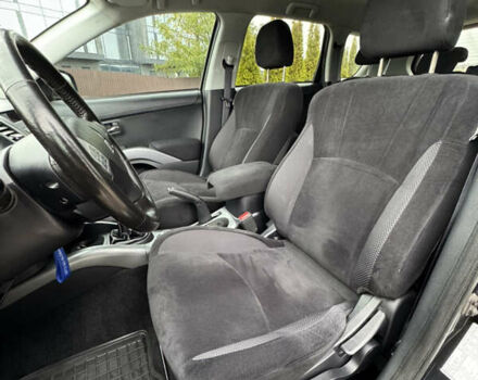 Чорний Міцубісі Аутлендер, об'ємом двигуна 2.36 л та пробігом 96 тис. км за 11700 $, фото 16 на Automoto.ua