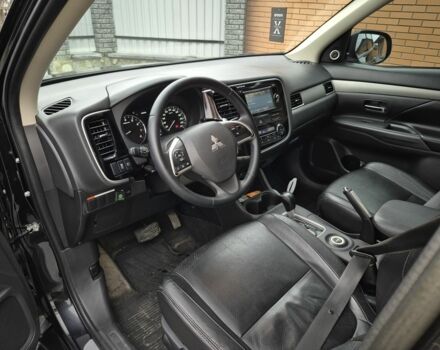 Черный Мицубиси Аутлендер, объемом двигателя 2.4 л и пробегом 211 тыс. км за 12590 $, фото 11 на Automoto.ua