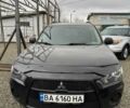 Чорний Міцубісі Аутлендер, об'ємом двигуна 2.36 л та пробігом 210 тис. км за 10500 $, фото 1 на Automoto.ua