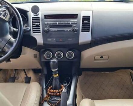 Черный Мицубиси Аутлендер, объемом двигателя 2.27 л и пробегом 195 тыс. км за 10500 $, фото 18 на Automoto.ua