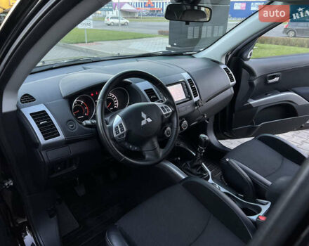 Чорний Міцубісі Аутлендер, об'ємом двигуна 2.3 л та пробігом 124 тис. км за 11999 $, фото 37 на Automoto.ua