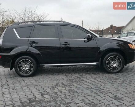 Черный Мицубиси Аутлендер, объемом двигателя 2.2 л и пробегом 188 тыс. км за 10999 $, фото 14 на Automoto.ua