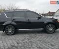 Черный Мицубиси Аутлендер, объемом двигателя 2.2 л и пробегом 188 тыс. км за 10999 $, фото 14 на Automoto.ua