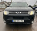 Черный Мицубиси Аутлендер, объемом двигателя 2.27 л и пробегом 202 тыс. км за 13100 $, фото 1 на Automoto.ua