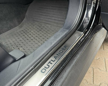 Чорний Міцубісі Аутлендер, об'ємом двигуна 2.36 л та пробігом 96 тис. км за 11700 $, фото 36 на Automoto.ua