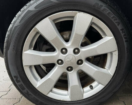 Чорний Міцубісі Аутлендер, об'ємом двигуна 2.36 л та пробігом 96 тис. км за 11700 $, фото 10 на Automoto.ua