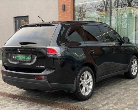 Черный Мицубиси Аутлендер, объемом двигателя 2.4 л и пробегом 212 тыс. км за 12990 $, фото 7 на Automoto.ua