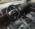 Міцубісі Аутлендер 2012 у Костополе на Automoto.ua Чорний Міцубісі Аутлендер, об'ємом двигуна 1.8 л та пробігом 248 тис. км за 10500 $, фото 6 на Automoto.ua
