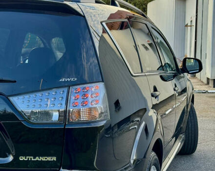 Мицубиси Аутлендер 2012 в Полтаве на Automoto.ua Черный Мицубиси Аутлендер, объемом двигателя 2.3 л и пробегом 194 тыс. км за 11450 $, фото 10 на Automoto.ua