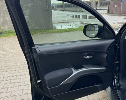 Чорний Міцубісі Аутлендер, об'ємом двигуна 2.36 л та пробігом 96 тис. км за 11700 $, фото 23 на Automoto.ua