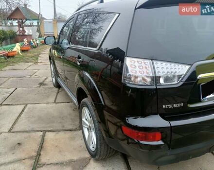 Черный Мицубиси Аутлендер, объемом двигателя 2.2 л и пробегом 218 тыс. км за 11500 $, фото 6 на Automoto.ua