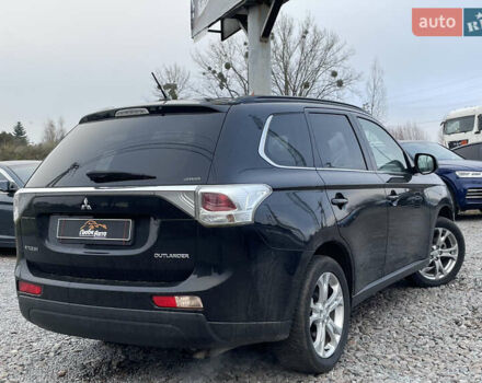 Чорний Міцубісі Аутлендер, об'ємом двигуна 2.27 л та пробігом 203 тис. км за 12600 $, фото 7 на Automoto.ua