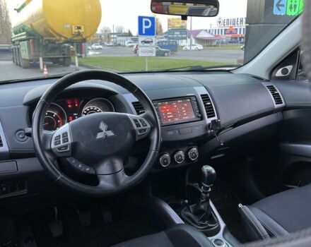 Черный Мицубиси Аутлендер, объемом двигателя 2.3 л и пробегом 124 тыс. км за 11999 $, фото 12 на Automoto.ua