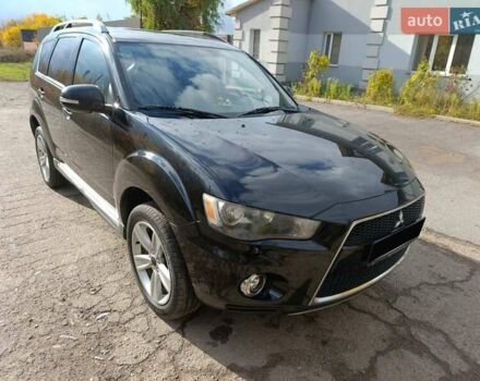 Черный Мицубиси Аутлендер, объемом двигателя 2.2 л и пробегом 218 тыс. км за 11800 $, фото 3 на Automoto.ua