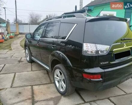 Черный Мицубиси Аутлендер, объемом двигателя 2.2 л и пробегом 218 тыс. км за 11500 $, фото 5 на Automoto.ua