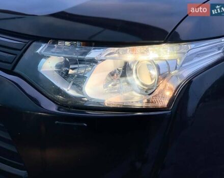 Черный Мицубиси Аутлендер, объемом двигателя 2.36 л и пробегом 212 тыс. км за 12990 $, фото 15 на Automoto.ua