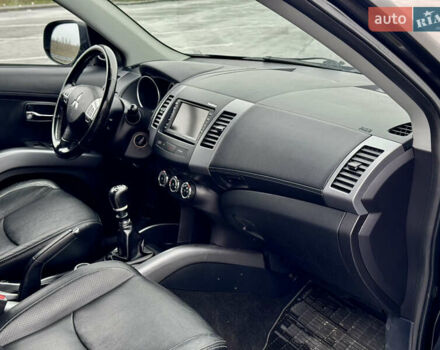 Черный Мицубиси Аутлендер, объемом двигателя 2.2 л и пробегом 215 тыс. км за 11450 $, фото 26 на Automoto.ua