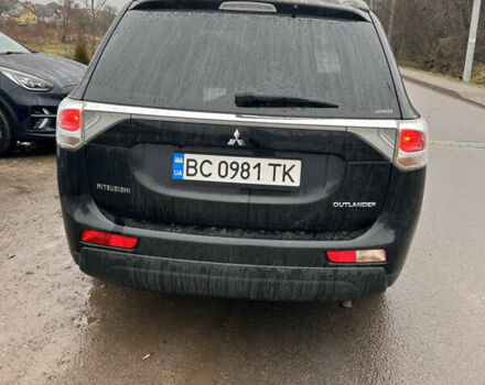 Черный Мицубиси Аутлендер, объемом двигателя 2.27 л и пробегом 202 тыс. км за 13100 $, фото 3 на Automoto.ua