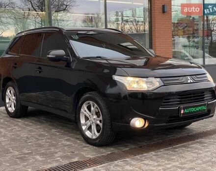 Черный Мицубиси Аутлендер, объемом двигателя 2.36 л и пробегом 212 тыс. км за 12990 $, фото 2 на Automoto.ua
