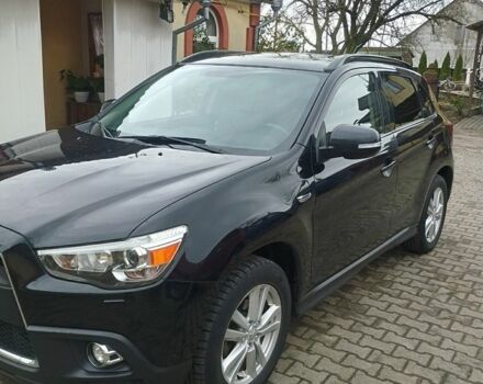 Міцубісі Аутлендер 2012 у Костополе на Automoto.ua Чорний Міцубісі Аутлендер, об'ємом двигуна 1.8 л та пробігом 248 тис. км за 10500 $, фото 2 на Automoto.ua