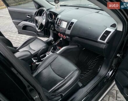 Черный Мицубиси Аутлендер, объемом двигателя 2.2 л и пробегом 188 тыс. км за 10999 $, фото 51 на Automoto.ua