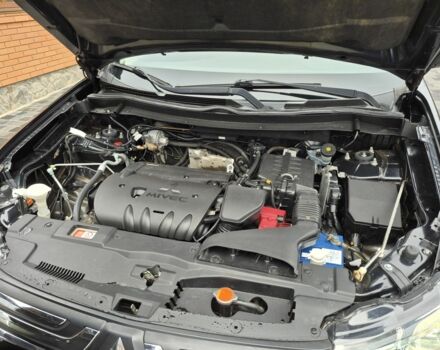 Черный Мицубиси Аутлендер, объемом двигателя 2.4 л и пробегом 211 тыс. км за 12590 $, фото 17 на Automoto.ua