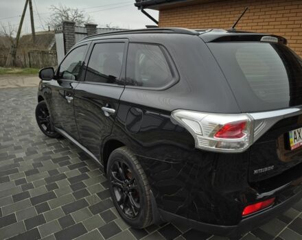 Черный Мицубиси Аутлендер, объемом двигателя 2.4 л и пробегом 211 тыс. км за 12590 $, фото 8 на Automoto.ua