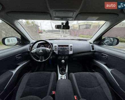 Чорний Міцубісі Аутлендер, об'ємом двигуна 2.36 л та пробігом 96 тис. км за 11700 $, фото 31 на Automoto.ua