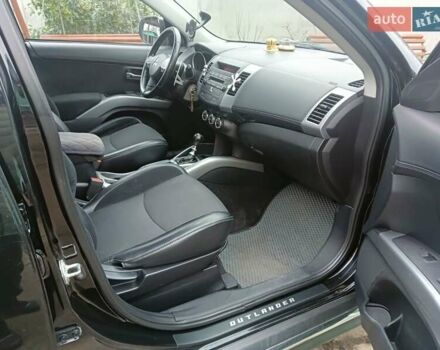 Черный Мицубиси Аутлендер, объемом двигателя 2.2 л и пробегом 218 тыс. км за 11500 $, фото 11 на Automoto.ua