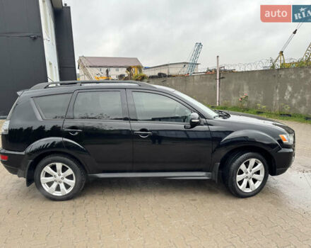 Чорний Міцубісі Аутлендер, об'ємом двигуна 2.36 л та пробігом 96 тис. км за 11700 $, фото 1 на Automoto.ua
