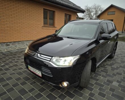 Черный Мицубиси Аутлендер, объемом двигателя 2.4 л и пробегом 211 тыс. км за 12590 $, фото 1 на Automoto.ua