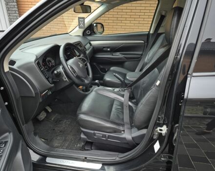 Черный Мицубиси Аутлендер, объемом двигателя 2.4 л и пробегом 211 тыс. км за 12590 $, фото 13 на Automoto.ua