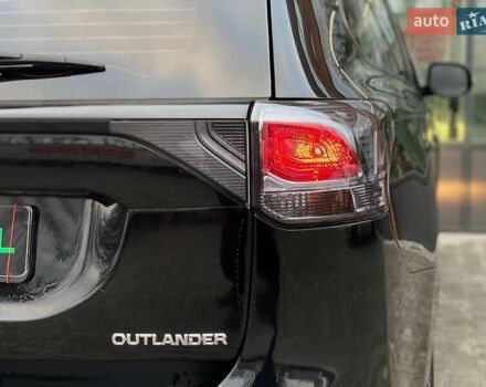 Черный Мицубиси Аутлендер, объемом двигателя 2.36 л и пробегом 212 тыс. км за 12990 $, фото 8 на Automoto.ua