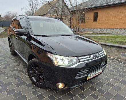 Черный Мицубиси Аутлендер, объемом двигателя 2.4 л и пробегом 211 тыс. км за 12590 $, фото 6 на Automoto.ua