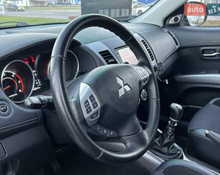 Чорний Міцубісі Аутлендер, об'ємом двигуна 2.3 л та пробігом 124 тис. км за 11999 $, фото 42 на Automoto.ua