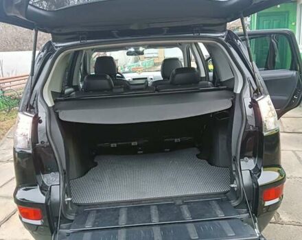 Черный Мицубиси Аутлендер, объемом двигателя 2.2 л и пробегом 218 тыс. км за 11500 $, фото 15 на Automoto.ua