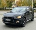 Черный Мицубиси Аутлендер, объемом двигателя 2 л и пробегом 250 тыс. км за 4850 $, фото 1 на Automoto.ua