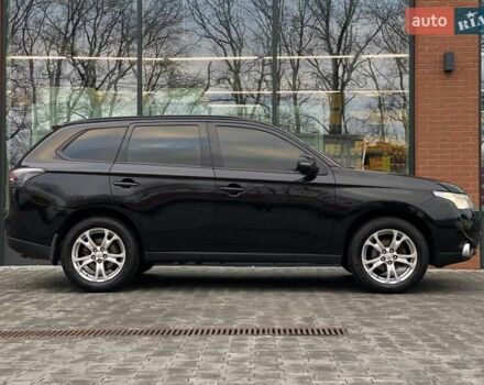 Черный Мицубиси Аутлендер, объемом двигателя 2.36 л и пробегом 212 тыс. км за 12990 $, фото 5 на Automoto.ua