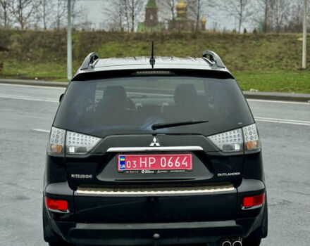 Черный Мицубиси Аутлендер, объемом двигателя 2.2 л и пробегом 215 тыс. км за 11450 $, фото 5 на Automoto.ua