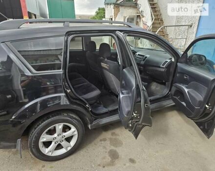 Чорний Міцубісі Аутлендер, об'ємом двигуна 2.36 л та пробігом 164 тис. км за 10800 $, фото 9 на Automoto.ua