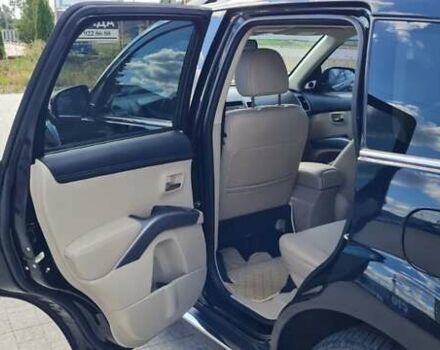 Черный Мицубиси Аутлендер, объемом двигателя 2.27 л и пробегом 195 тыс. км за 10500 $, фото 26 на Automoto.ua