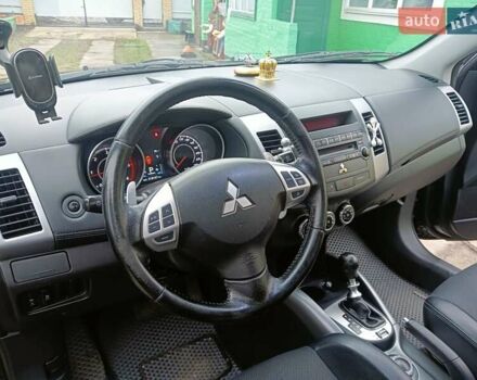 Черный Мицубиси Аутлендер, объемом двигателя 2.2 л и пробегом 218 тыс. км за 11500 $, фото 19 на Automoto.ua