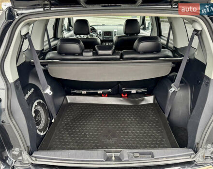 Черный Мицубиси Аутлендер, объемом двигателя 2.2 л и пробегом 215 тыс. км за 11450 $, фото 32 на Automoto.ua