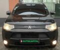 Черный Мицубиси Аутлендер, объемом двигателя 2.4 л и пробегом 212 тыс. км за 12990 $, фото 2 на Automoto.ua