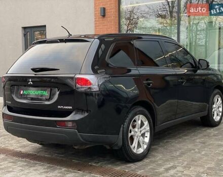 Черный Мицубиси Аутлендер, объемом двигателя 2.36 л и пробегом 212 тыс. км за 12990 $, фото 9 на Automoto.ua