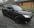 Черный Мицубиси Аутлендер, объемом двигателя 2.4 л и пробегом 211 тыс. км за 12590 $, фото 4 на Automoto.ua