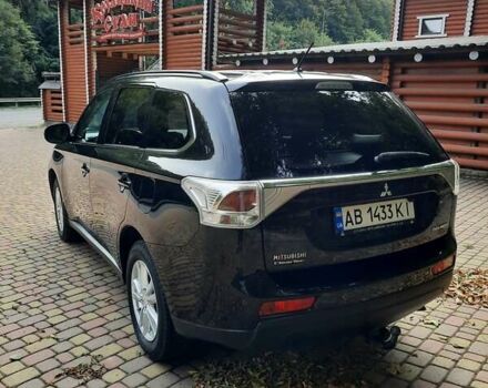 Черный Мицубиси Аутлендер, объемом двигателя 2.27 л и пробегом 256 тыс. км за 13600 $, фото 2 на Automoto.ua