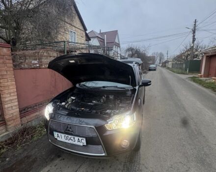 Черный Мицубиси Аутлендер, объемом двигателя 2.4 л и пробегом 136 тыс. км за 14500 $, фото 4 на Automoto.ua