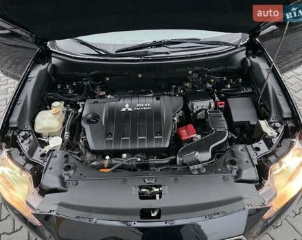 Черный Мицубиси Аутлендер, объемом двигателя 2.2 л и пробегом 188 тыс. км за 10999 $, фото 22 на Automoto.ua