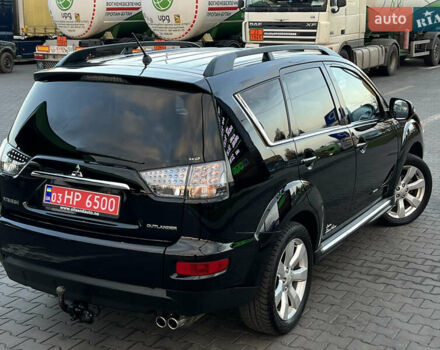 Чорний Міцубісі Аутлендер, об'ємом двигуна 2.3 л та пробігом 124 тис. км за 11999 $, фото 1 на Automoto.ua